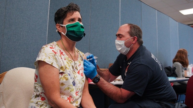 Health care worker getting vaccine