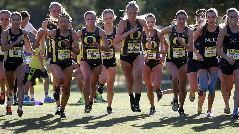 Ducks women cross-country runners during a meet