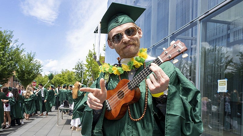 Graduate playing ukulele