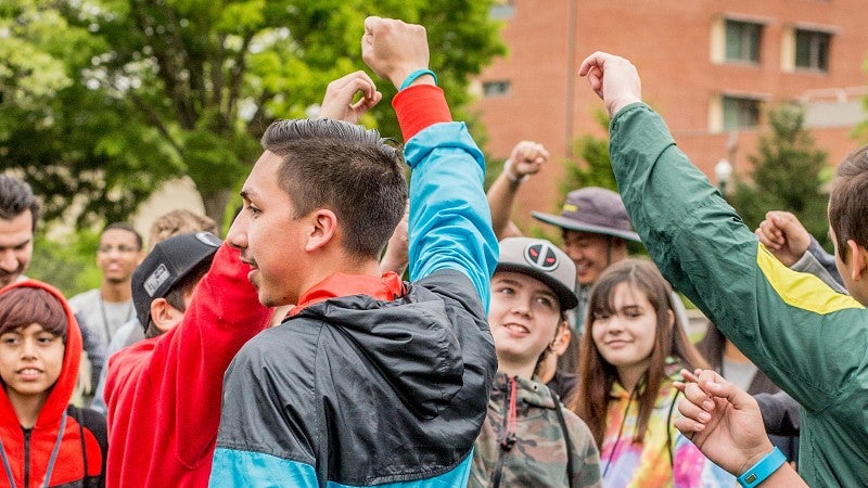 Teens gather for a cheer 