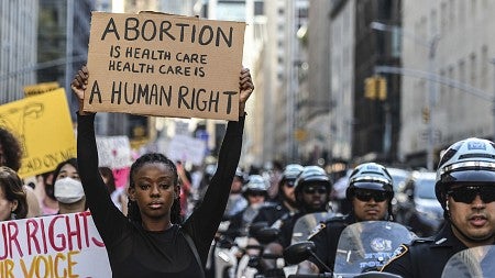 Pro choice protestor holding sign