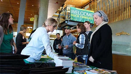 Families checking in for Fall Family Weekend in the Ford Alumni Center.