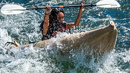 IPCA student kayaking in rapids