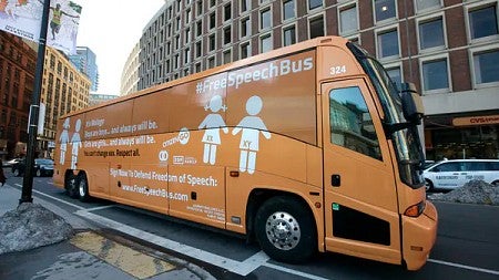 Bus with anti-trans slogans