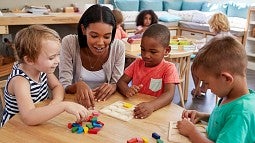 Preschool teacher with students