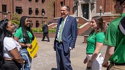 Incoming UO President Karl Scholz with students