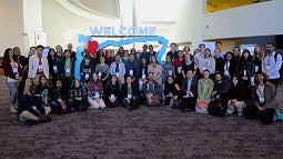 Group shot of STEM students at conference