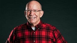 Peter DeFazio wearing red plaid shirt