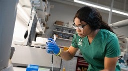 Colleen Uzoekwe in a research lab
