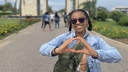 A UO student at the Black Star Gate in Accra, Ghana