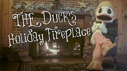 The Duck sitting beside a fireplace