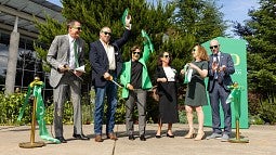 People celebrating a ribbon-cutting