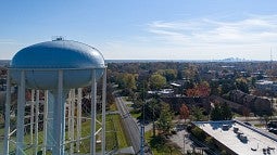 Water tower next to a small town