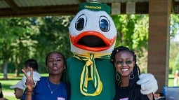 international students at picnic with the Duck