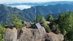 Wildfire camera mounted on a ridge near a fire
