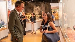 President Karl Scholz talks with employees at MNCH