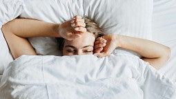 Teen in bed waking up