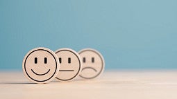 smiling and frowning face icons