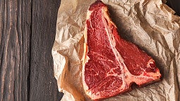 Raw steak on butcher paper