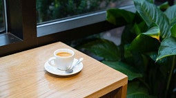 Cup of coffee on coffee table