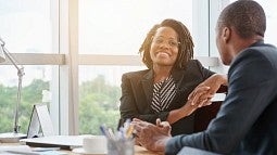 Man and women in meeting