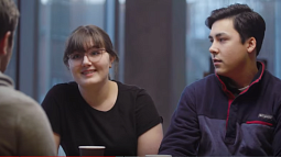 Three people talking together