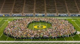 Class of 2025 on Autzen field in the shape of an "O"