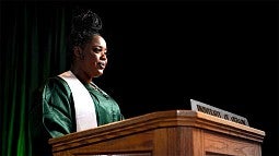 Sabinna Pierre at podium