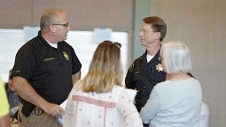 Eugene and UO police chiefs with Eugene mayor on welcome walk.