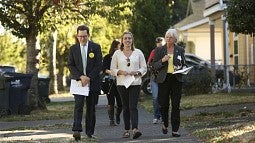 UO President Michael Schill, ASUO President Helena Schlegel and Eugene Mayor Kitty Piercy met neighborhood residents on the Community Welcome walk