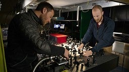 Doctoral students David Miller (left) and Andrew Blaikie 