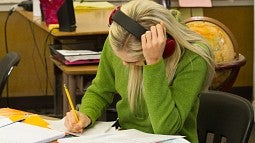 Student wearing noise-canceling headphones