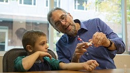Brendan Bohannan with child