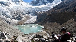Mark Carey conducting research at Lake Palcacocha, Cordillera Blanca, Peru.