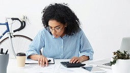 Woman paying bills