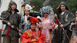 UO student Ming Canaday (center) with her parents and others at the Great Wall of China