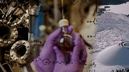 Stock image of hands working on research in a lab