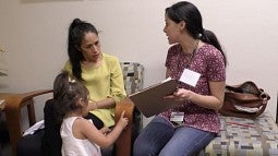 Interviewing a mother in the dual language lab