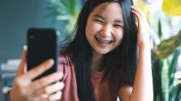 Woman taking selfie