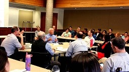 U.S. Rep. Peter DeFazio talks with UO faculty membes and students