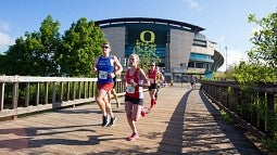 Runners near Autzen Stadium