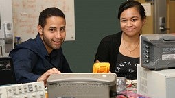 Master's students Stefano Feijoo (left) and Jade Aiona