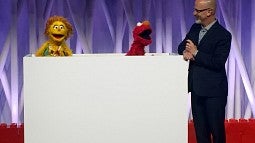 UO psychology professor Phil Fisher with the Muppets.