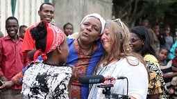 Griffith’s mother Abu greets Funk with a hug