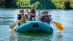 Group of IPCA participants on a raft