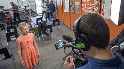 Student practicing in front of camera