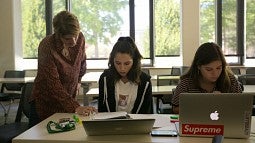 Professor with students