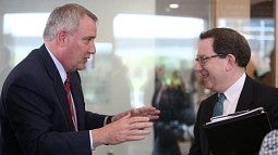 OHSU President Joe Robertson (left) and UO President Michael Schill