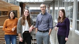 Hongmi Lee (far left) and Brice Kuhl (second from right) with other lab members.