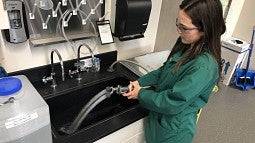 Student wearing new lab coat